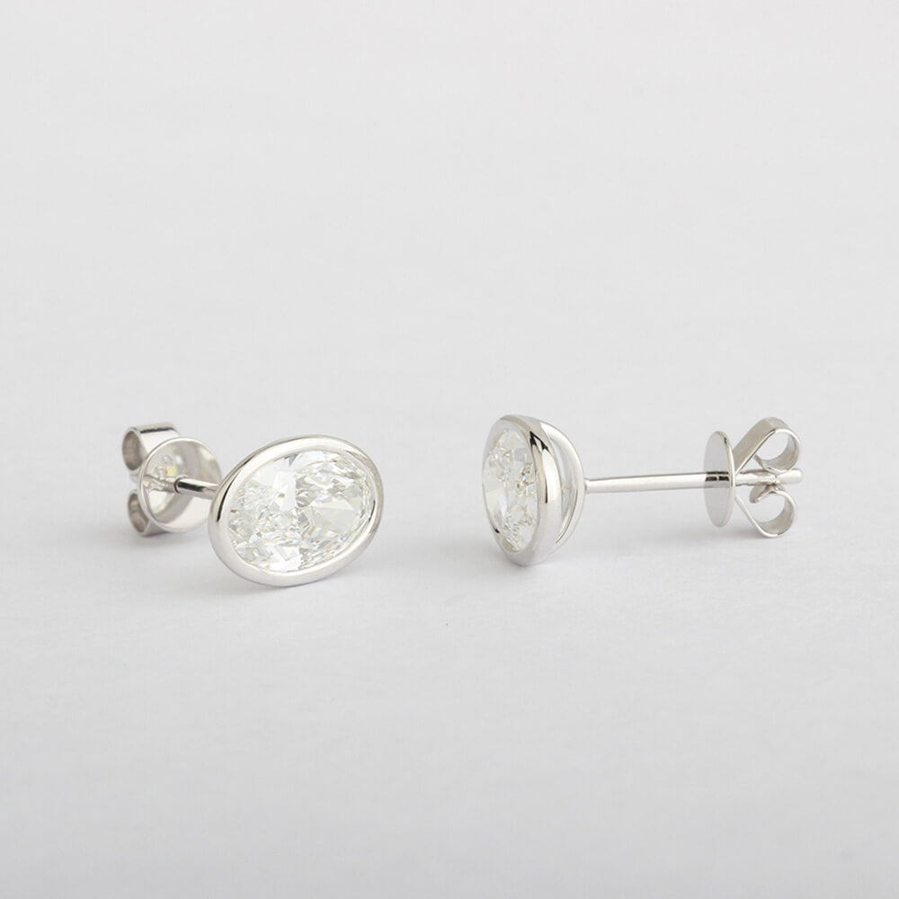 Affordable Luxury Jewelry Bezel Oval Lab-Grown Diamond Studs Earring (2.14 Ct. Tw.)