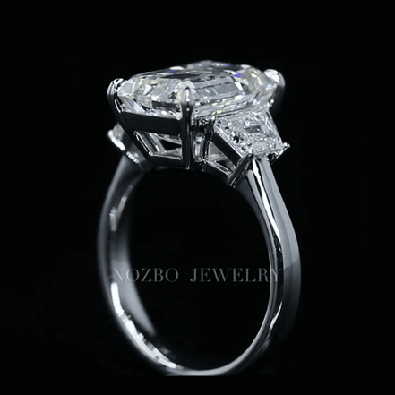 7 Carat Emerald Cut Lab Grown Diamond Side Trapezoid Three Stone Diamond Ring