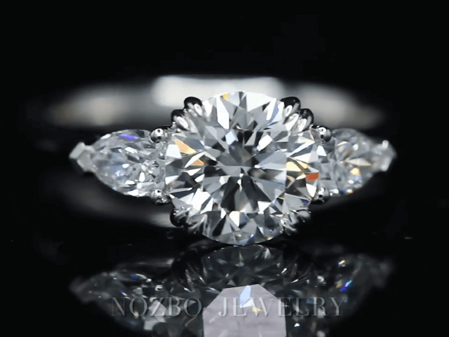 Three-Stone 1 Carat Round Diamond With Pear Side Stones Ring 18K Gold