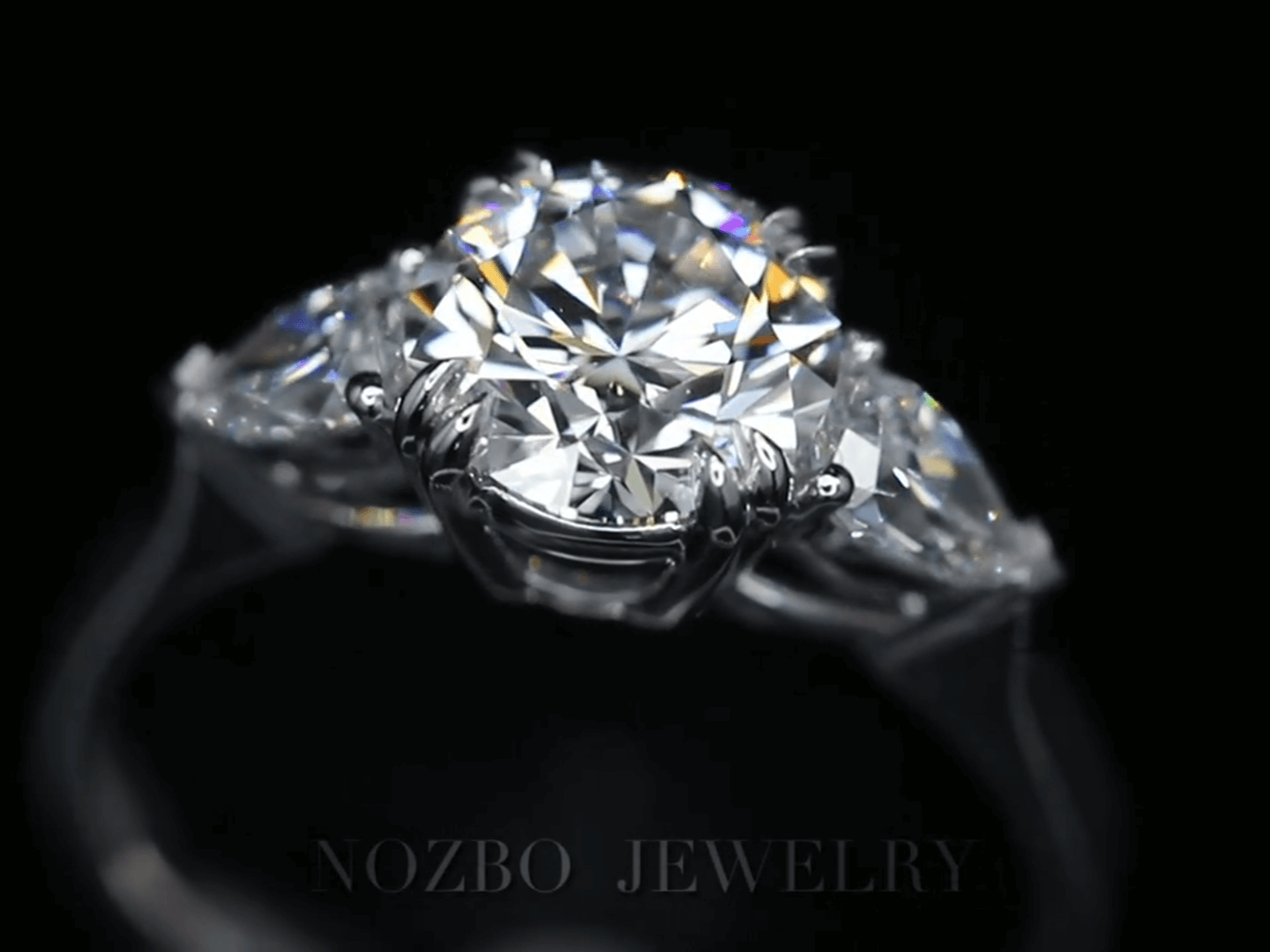 Three-Stone 1 Carat Round Diamond With Pear Side Stones Ring 18K Gold