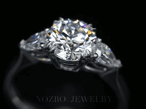 Three-Stone 1 Carat Round Diamond With Pear Side Stones Ring 18K Gold