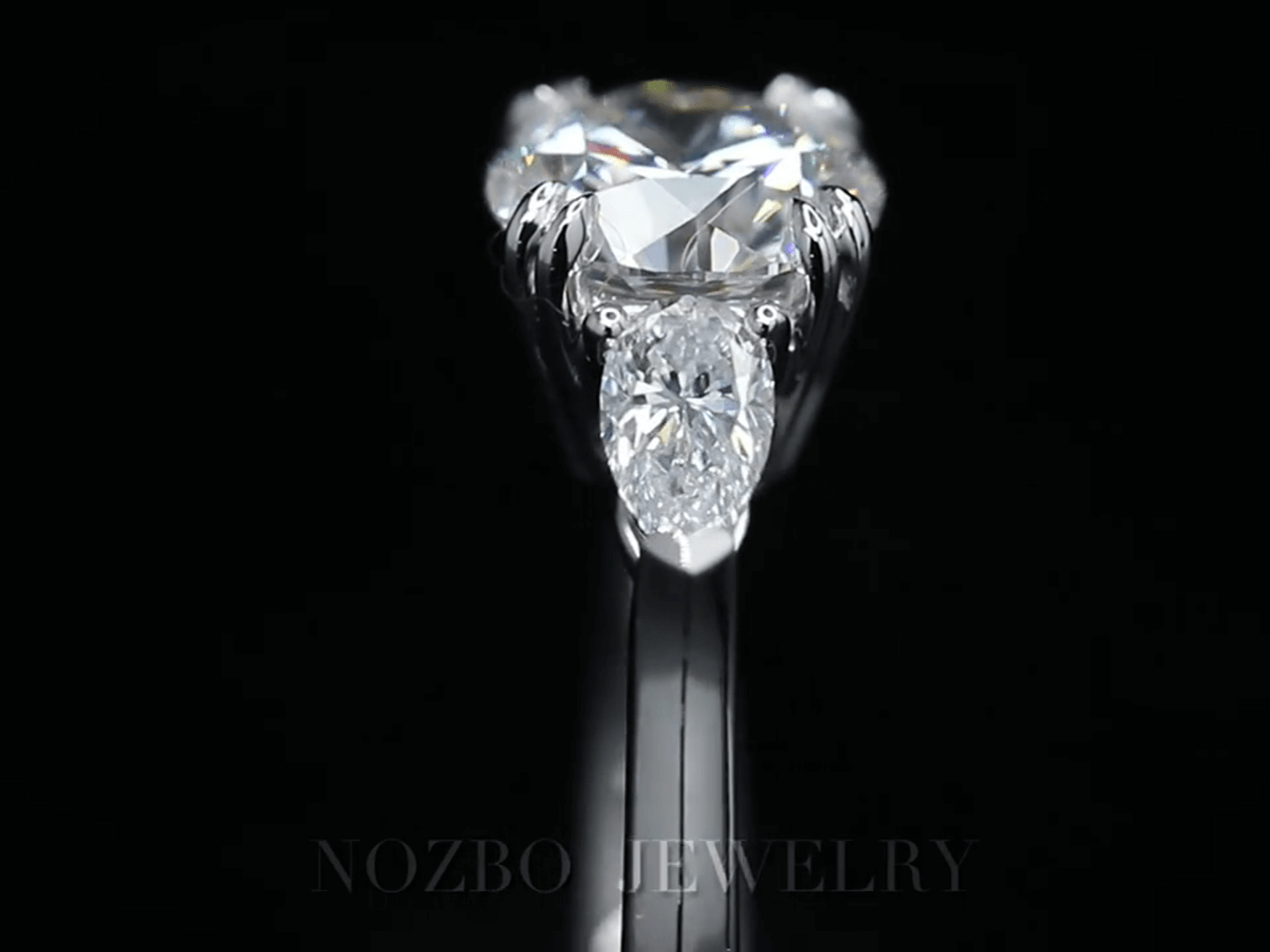 Three-Stone 1 Carat Round Diamond With Pear Side Stones Ring 18K Gold
