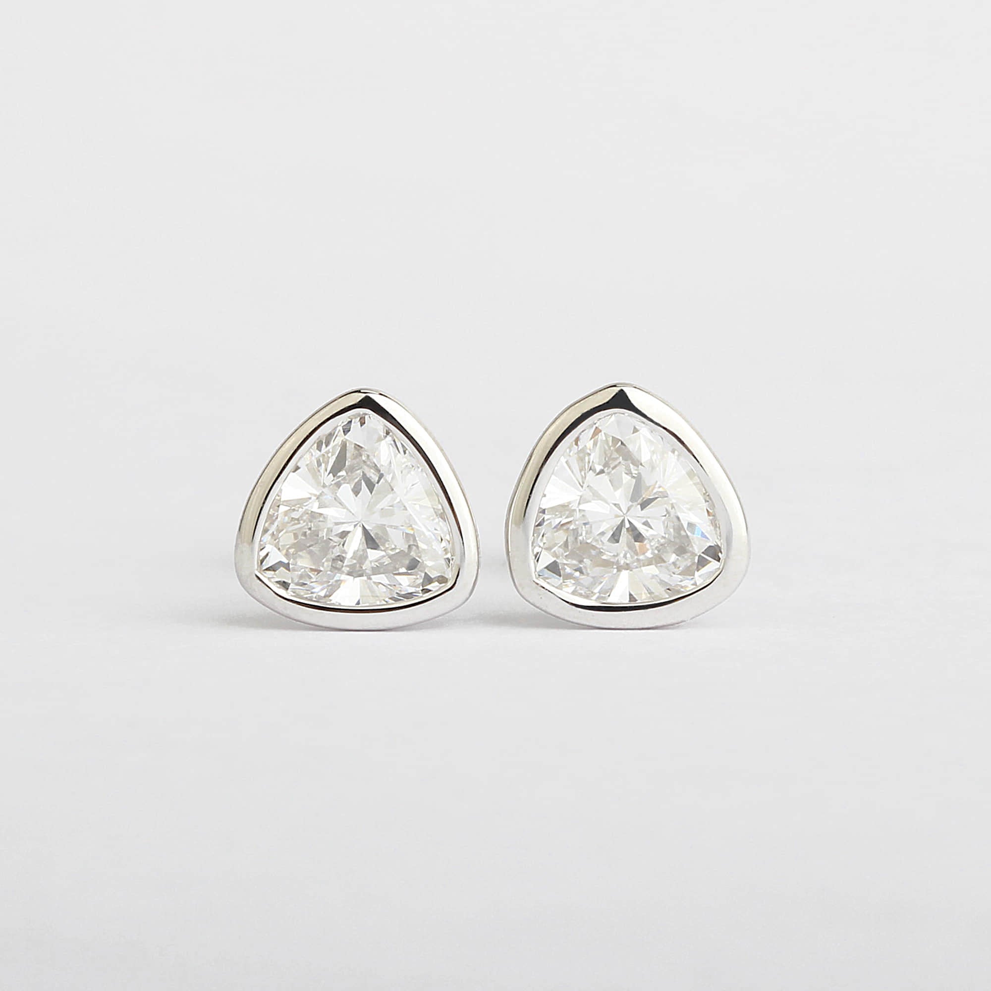 Bezel Trillion Cut Solitaire Lab-Grown Diamond Studs (1.31 Ct. Tw.)